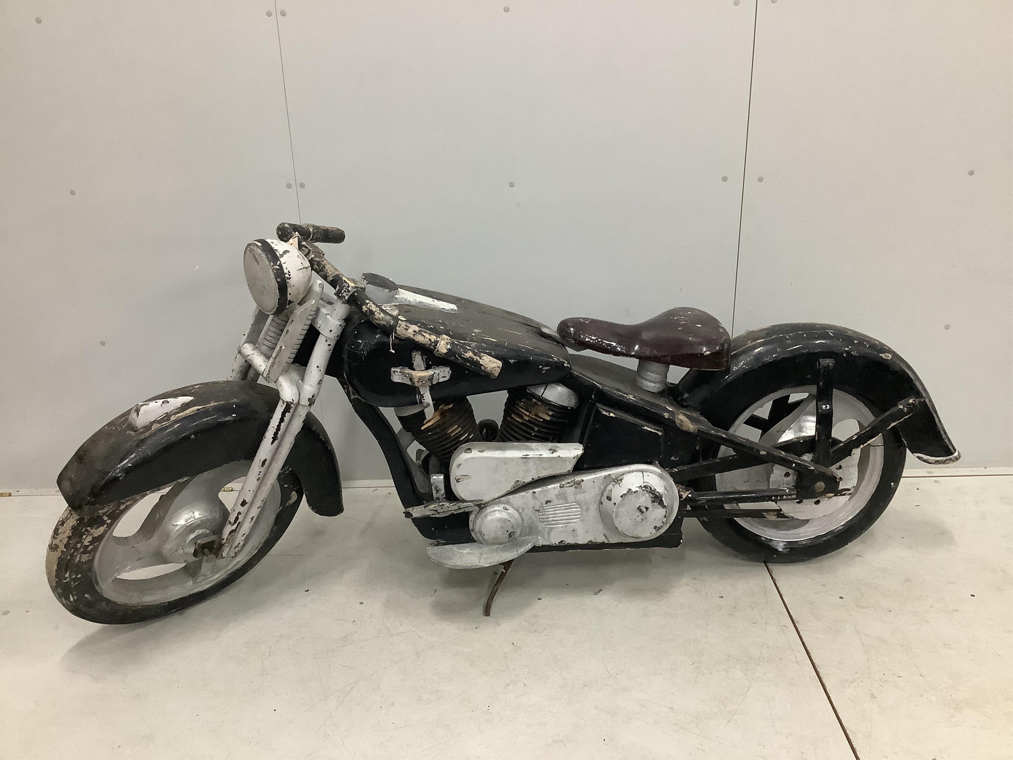 A wooden Harley Davidson, possibly an advertising piece, length 220cm. Condition - poor